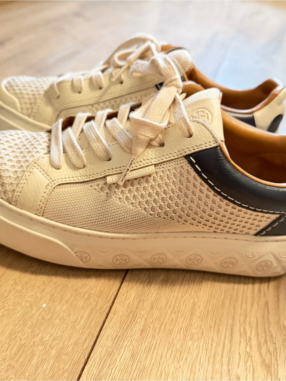 Tory Burch women’s Cream & Black Leather Sneaker